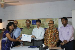 A participant receiving her certificate from Deputy Commissioner of Nilphamari district Md. Hafizur Rahman Chowdhury